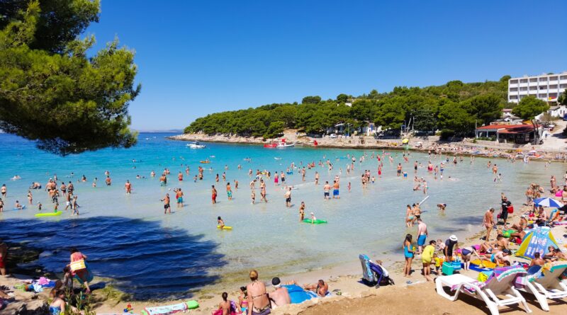 Crowded sandy beach on Murter island in Croatia