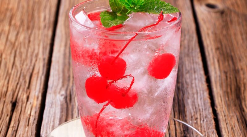 Iced drink with maraschino cherries